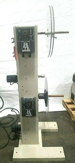 Used PA Industries Double Coil Motorized Stock Reel with Paper Interleaf Payoff Feed