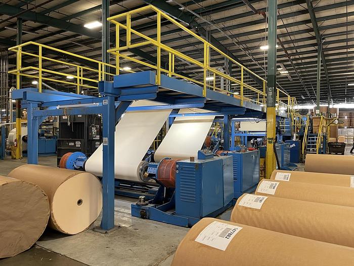 Used 65" JAGENBERG SYNCRO DUAL ROTARY KNIFE SHEETER W/ 4 SHAFTLESS UNWIND STANDS