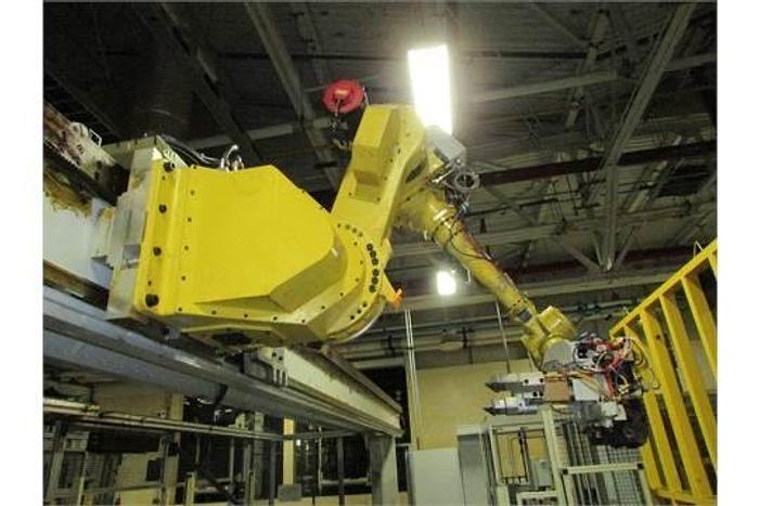Used FANUC GANTRY ROBOT SYSTEM WITH M710iB/70T ROBOT 8' TALL X 10,200 MM TRAVEL RJ3iB CONTROLLER