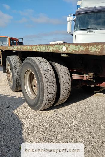 Used 1990 Iveco Turbostar 190-36 6X2 flatbed truck.