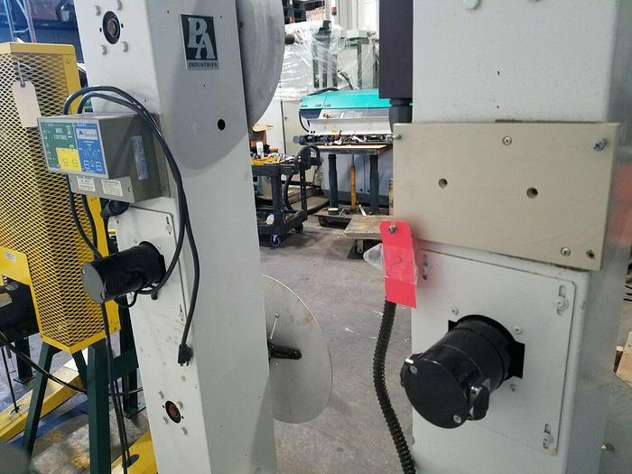 Used PA Industries Motorized Material Stock Reel with Paper Interleaf