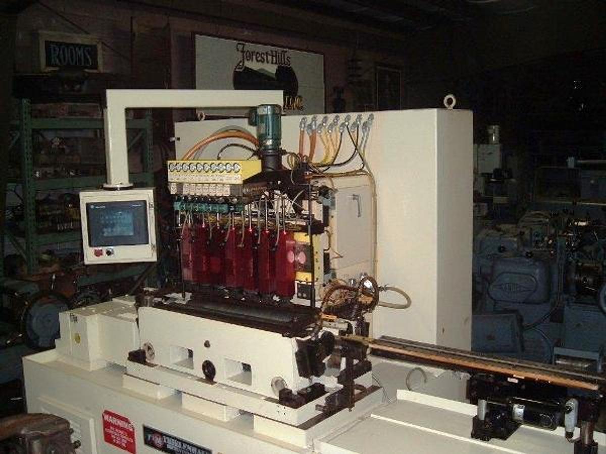 Used Thielenhaus #SF125, thru feed, 8 each heads, will take 10 heads, 1999