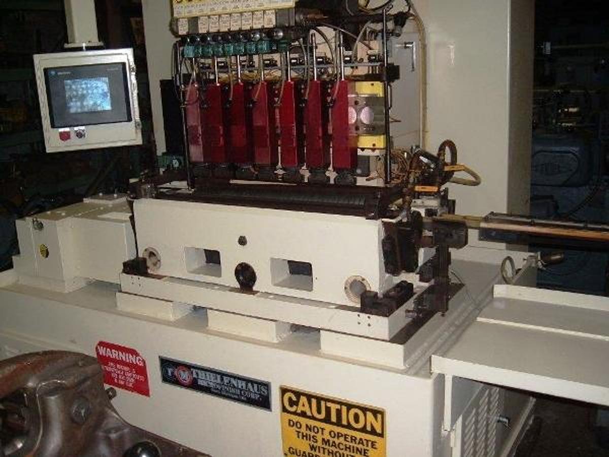Used Thielenhaus #SF125, thru feed, 8 each heads, will take 10 heads, 1999