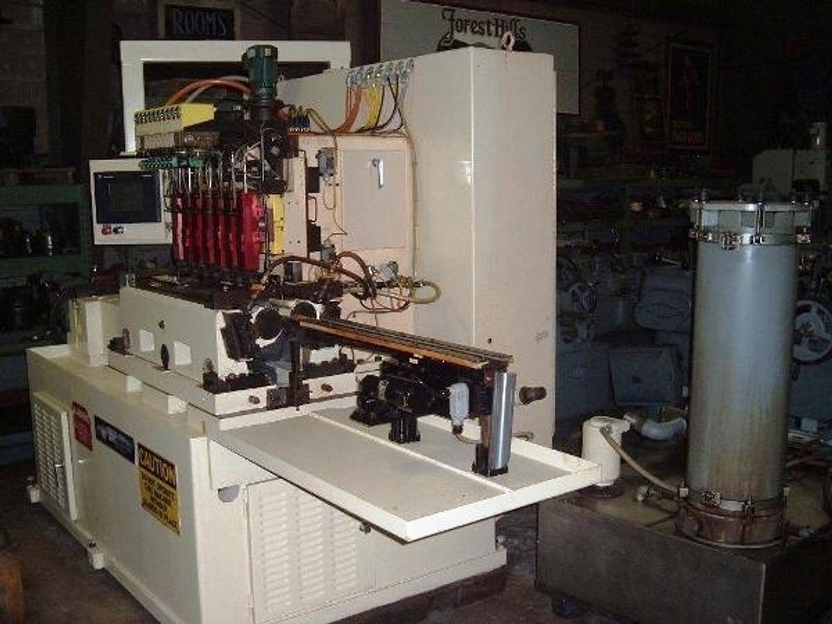 Used Thielenhaus #SF125, thru feed, 8 each heads, will take 10 heads, 1999