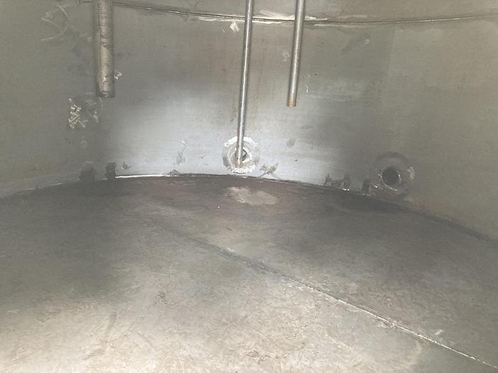 Used Used Wolfe Mechanical 20,000 gallon 304 stainless steel vertical storage tank. 