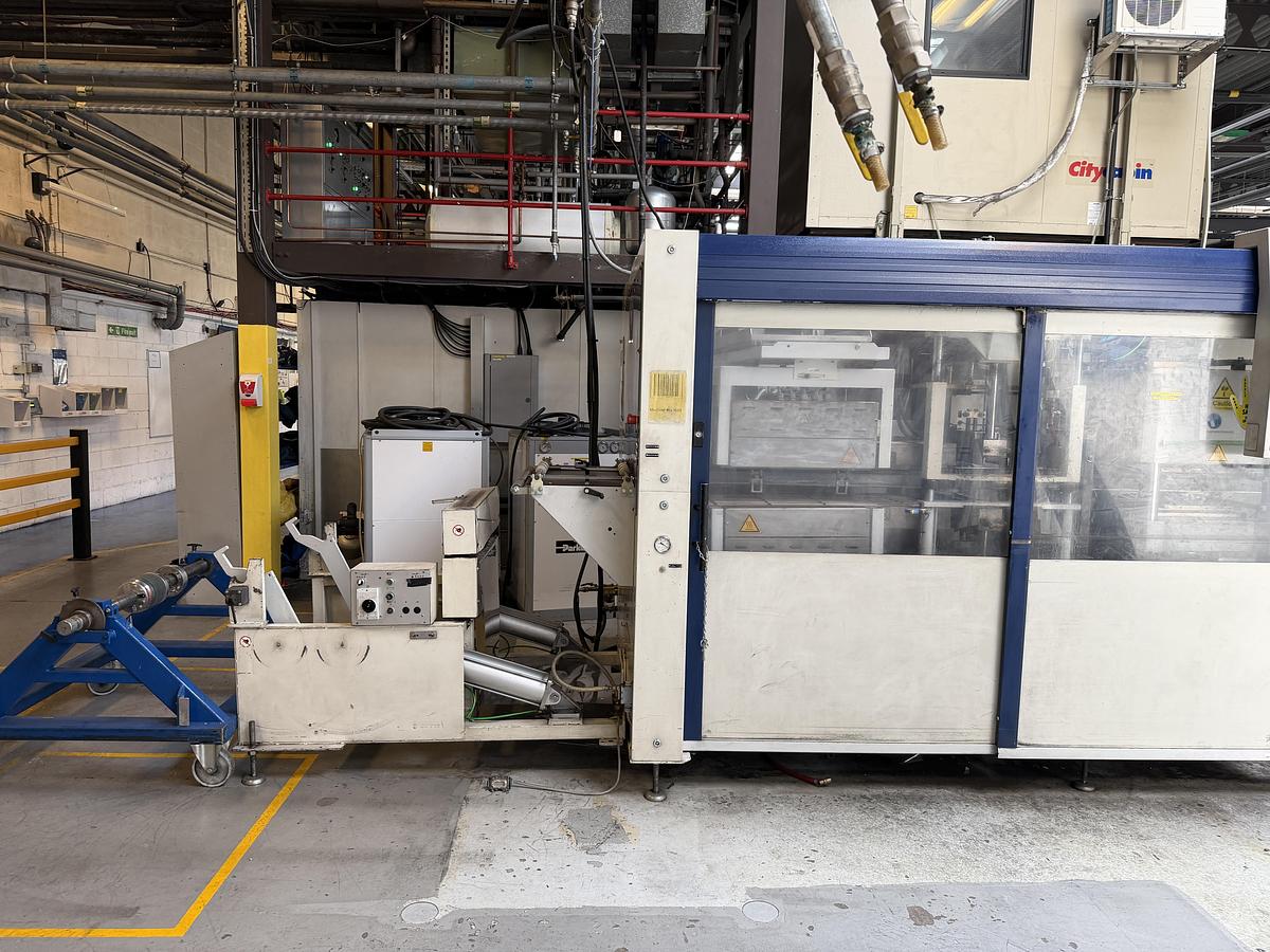 Used 500mm x 350mm Illig Model RD53 pressure forming machine 2004 with unwind and stacker