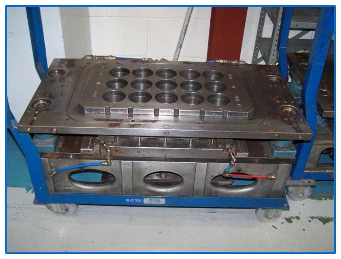 Used Illig RDM 58/3 71mm 15 impression tool with stacker parts