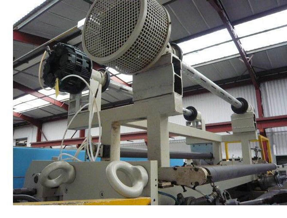 Used 1860mm wide Krauss Maffei Omipa sheet extrusion line. KMD130 Krauss Maffei extruder, 1800mm wide Omipa 3 roll stack, haul off, 2 station winder 1990