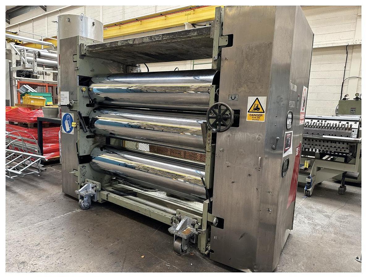 Used 1956mm Wide Welex 3 Roll Polishing Stack. 450mm diameter chrome rolls. . Hydraulic nip with power pack and accumulator. 2 roll haul off