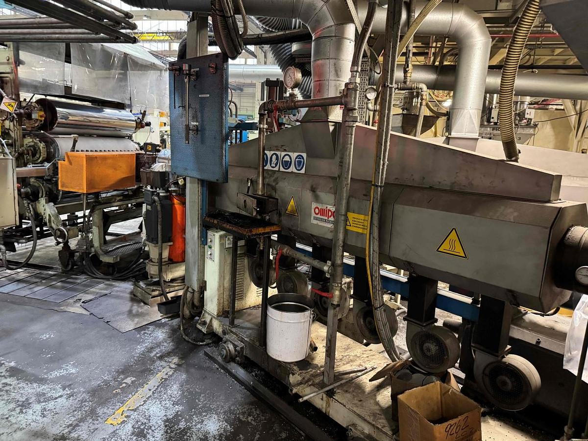Used 1350mm wide Omipa coextrusion sheet line with 120mm 90mm 60mm extruders, feedblock,  1300mm x 400mm calender, pump group haul off, Guillotine. 1999