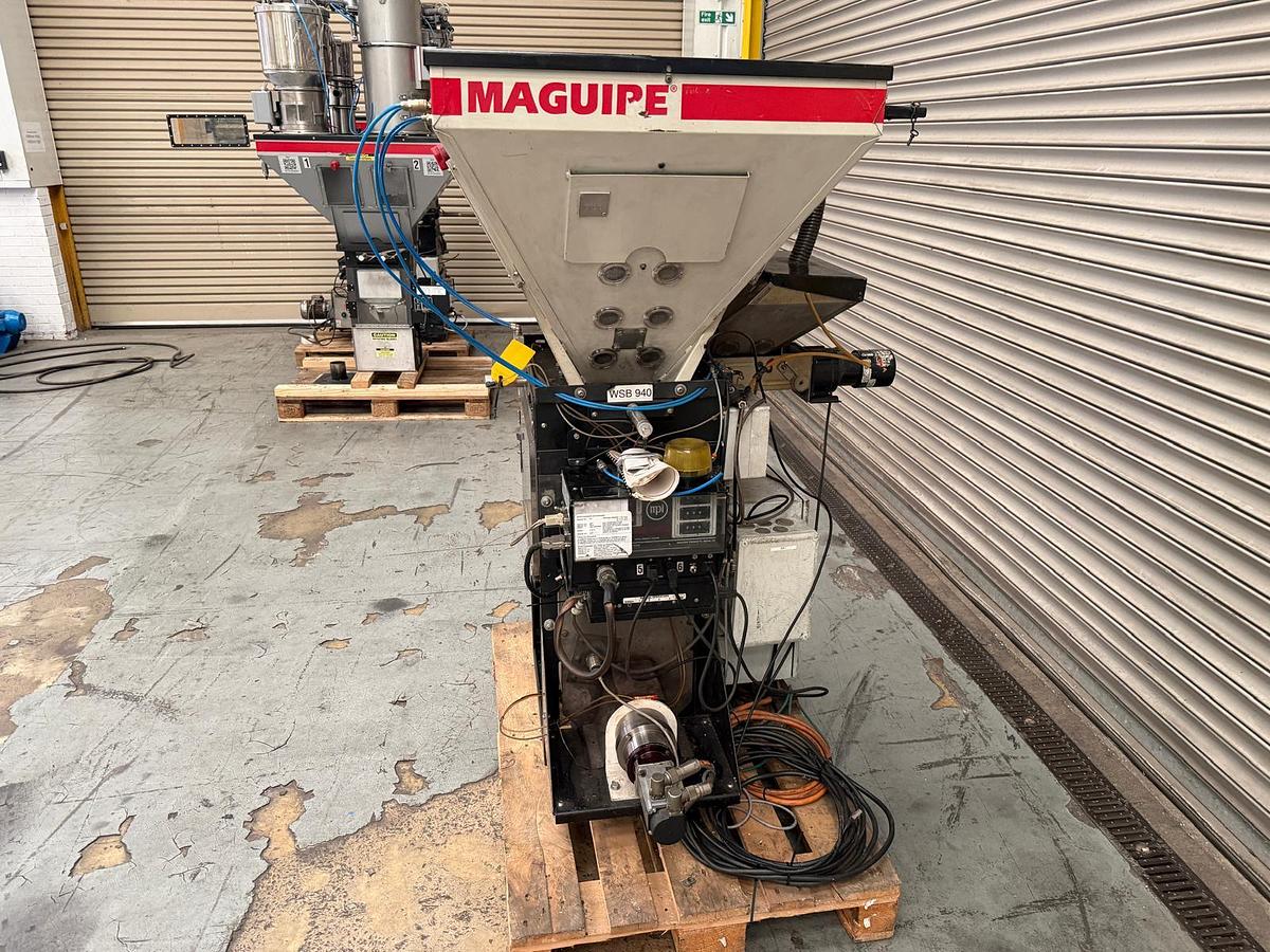 Used 4 component Maguire model WSB 940 gravimetric blender with hopper loaders, and dust collection.