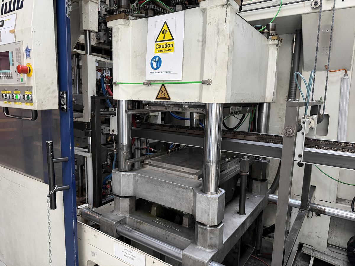 Used 500mm x 350mm Illig Model RD53 pressure forming machine 2004 with unwind and stacker