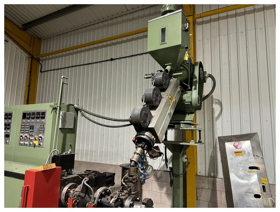 Used 1040mm wide Welex coextrusion sheet line with 90mm + 50mm extruders, GP, die, 1040mm wide x 450mm calender, pumps, haul off winder. 1996