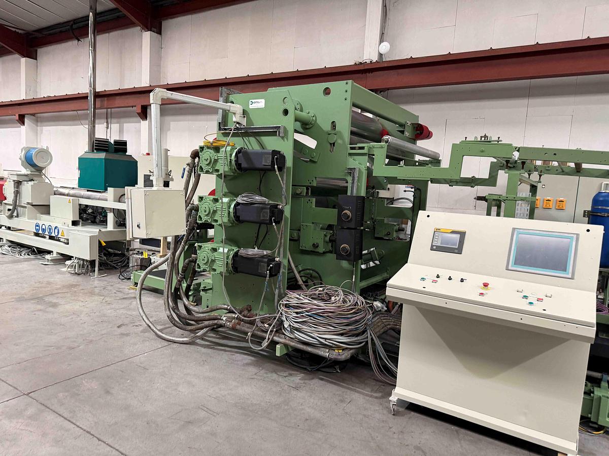 Used 1900mm wide Omam 3 roll polishing stack with 500mm dia rolls pump group and haul off. Spare rolls, hydraulic nip with pump unit, haul off. Operator panel.