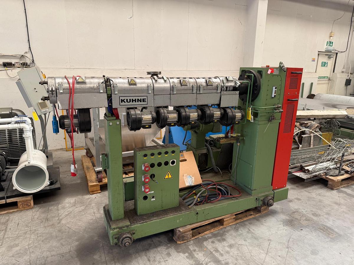 Used 45mm Kuhne single screw extruder model K45E-33D with 5.91:1 gearbox. Electrically heated, fan cooled barrel1999
