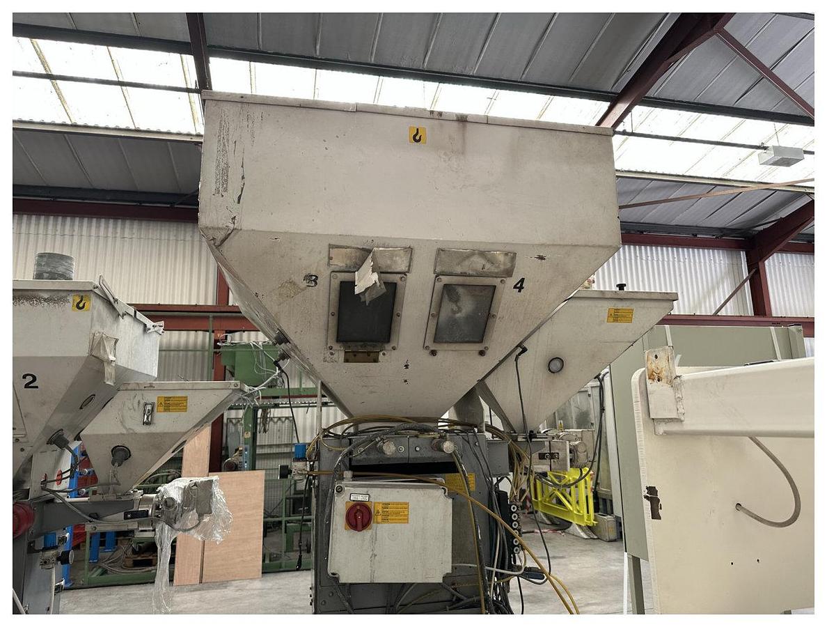 Used Piovan Model Mdw 1000/41 Gravimetric Blender. Additional side feeder station Year 2000