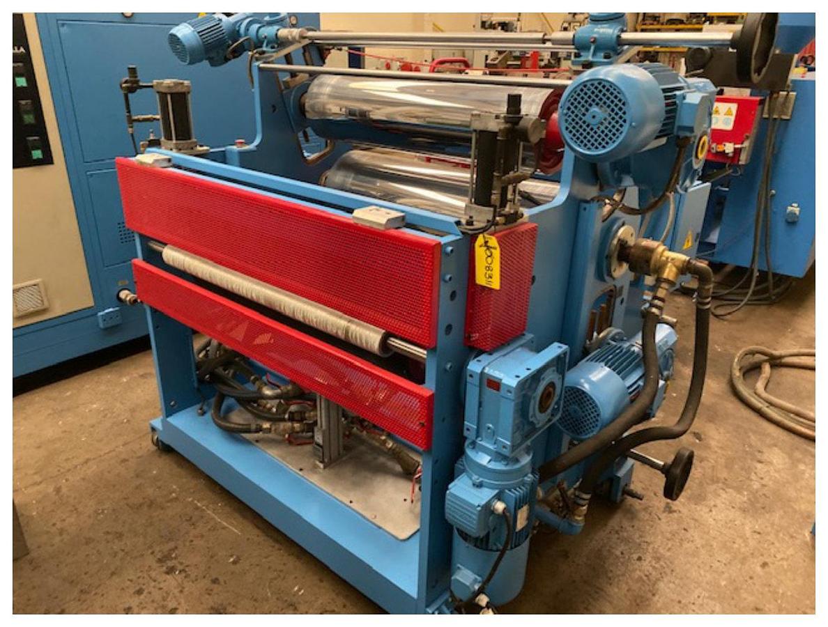 Used 1000mm Union 3 roll polishing stack with 250x350x350mm rolls. Model TAV1000.   1000mm wide close coupled 2 roll haul off Sella 3 zone pump group