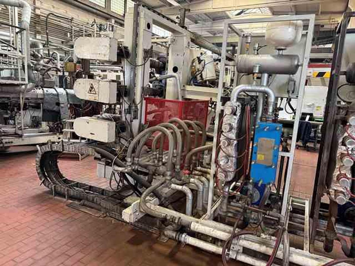 Used 2400mm wide Reifenhauser 3 roll polishing stack with thermoregulation, haul off. 2400mmx500mm individual drives. Variable speed haul off. In line knives.