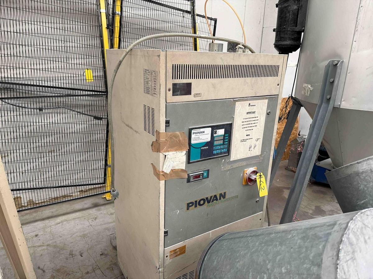 Used 600 litre Piovan dumidifying dryer model DSN520ME with T600IX insulated Vessel. Year 2000
