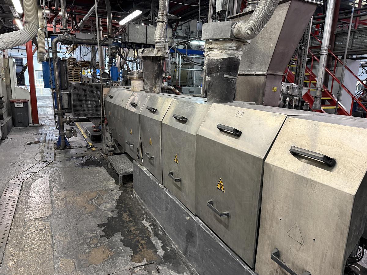 Used 110mm Berstorff model ZE110 A UT 44D twin screw compounding line. 600rpm screws. 1080kw motor. Brabender feeders. Gala EAC model 7