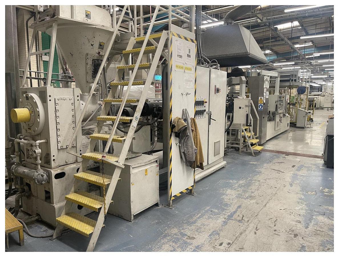 Used 1040mm Welex coextrusion line, Grav blender, Crammer feeder. 120mm extruder 65mm Coextruder, die. 1040mm 3 roll stack, haul off and winder 1998