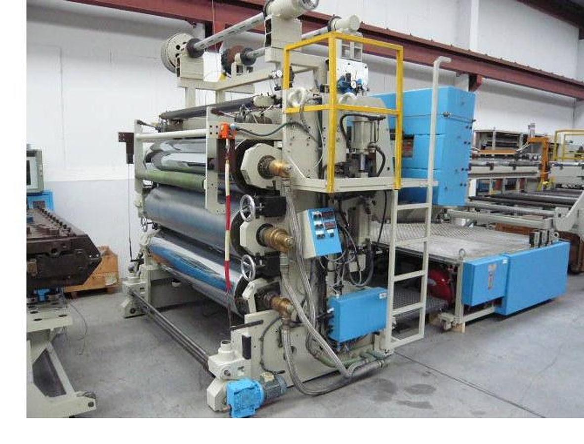 Used 1860mm wide Krauss Maffei Omipa sheet extrusion line. KMD130 Krauss Maffei extruder, 1800mm wide Omipa 3 roll stack, haul off, 2 station winder 1990