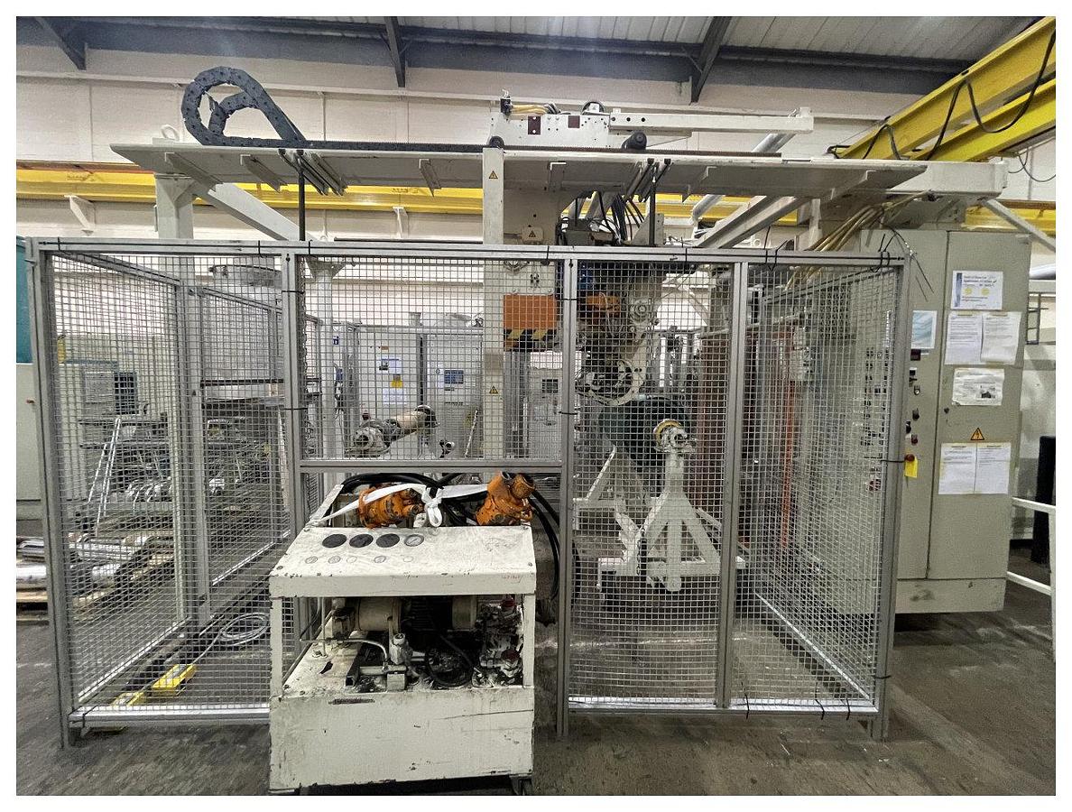 Used 1000mm wide Maier 2 station auto splice winder with overhead frame. Model WMN 24-M1-1000-F-T3 Max diameter 1000mm. Accumulator. 1991