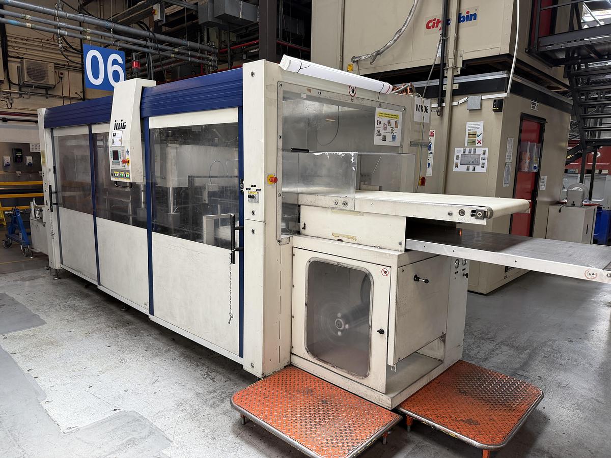 Used 500mm x 350mm Illig Model RD53 pressure forming machine 2004 with unwind and stacker