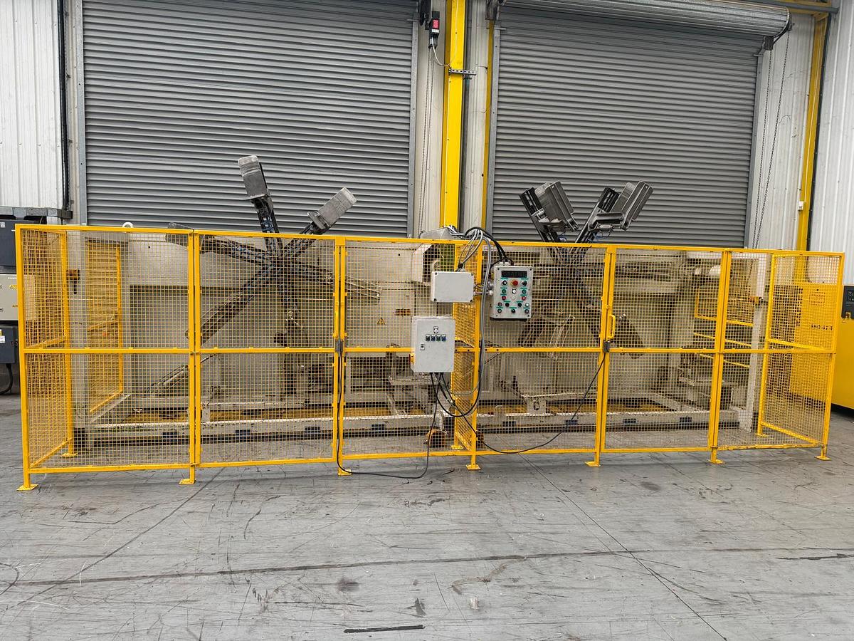 Used 20-63mm Graewe Double Semi Automatic coiler model DW2300R 550mm core, Max coil od 1250mm