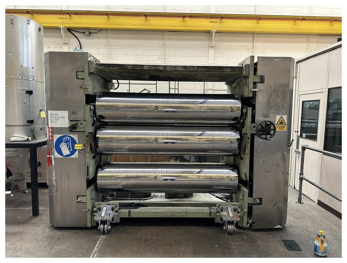 Used 1956mm Wide Welex 3 Roll Polishing Stack. 450mm diameter chrome rolls. . Hydraulic nip with power pack and accumulator. 2 roll haul off