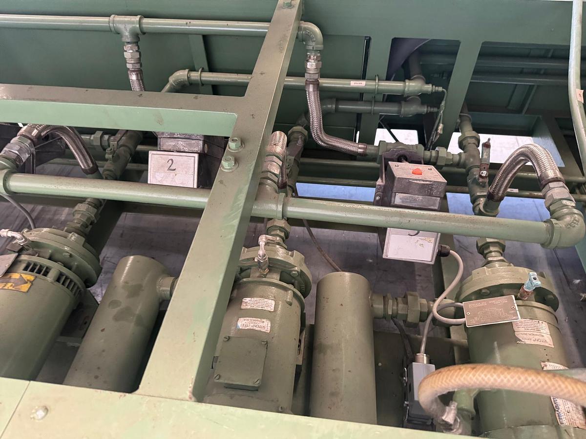 Used 890mm x 300mm Welex 3 roll polishing stack with pump group, and haul off. Silent chain driven rolls, pneumatic nip, 97