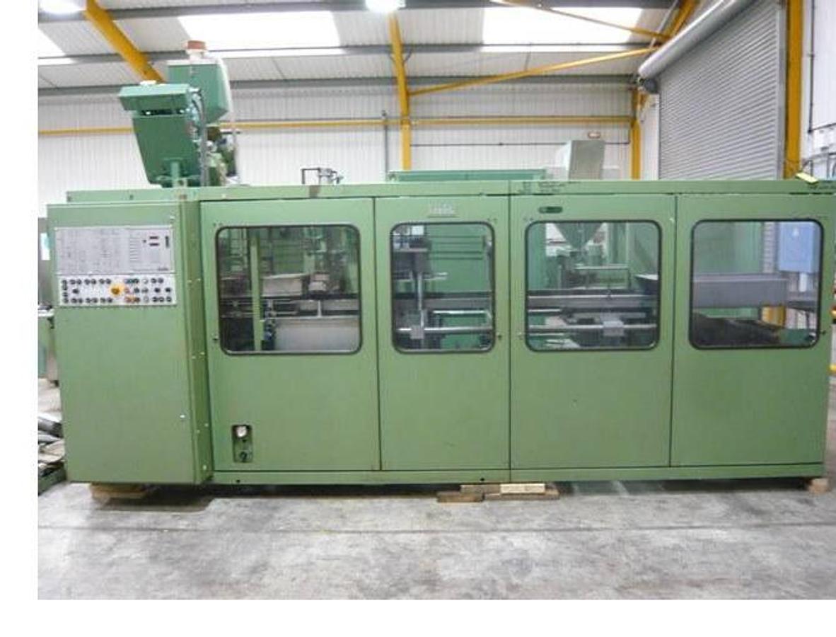 Used 350mm X 500mm Wide Illig RV53, vacuum forming machine With Steel Rule Punch Station, and stacker. 1989. Movable bottom platen.