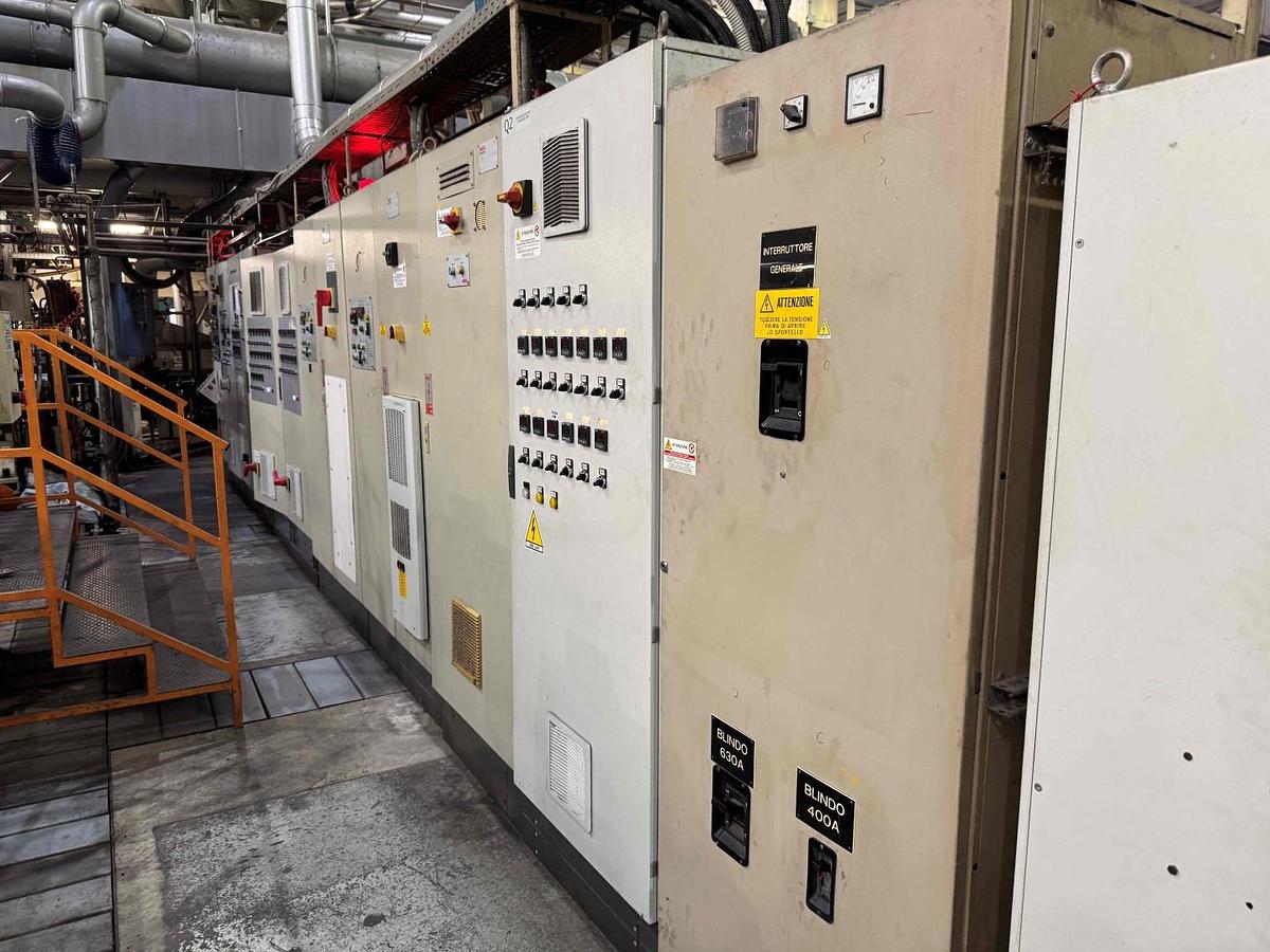 Used 1350mm wide Omipa coextrusion sheet line with 120mm 90mm 60mm extruders, feedblock,  1300mm x 400mm calender, pump group haul off, Guillotine. 1999