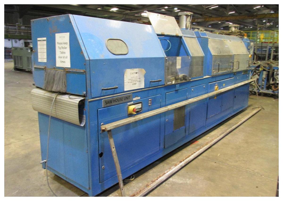 Used 90mm Krauss Maffei Coex Upvc Profile 1992. 90mm Twind Screw Extruder. 30mm Co Extruder. Calbration  Table, Saw Unit.