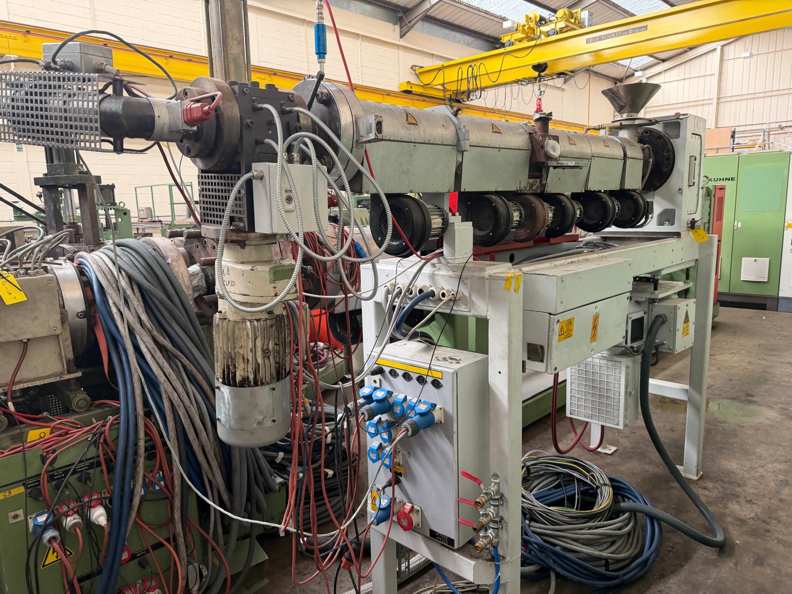 Used 60mm Kuhne 33D vented coextruder with 25kw dc motor. filter, and Normag gear pump. 2002