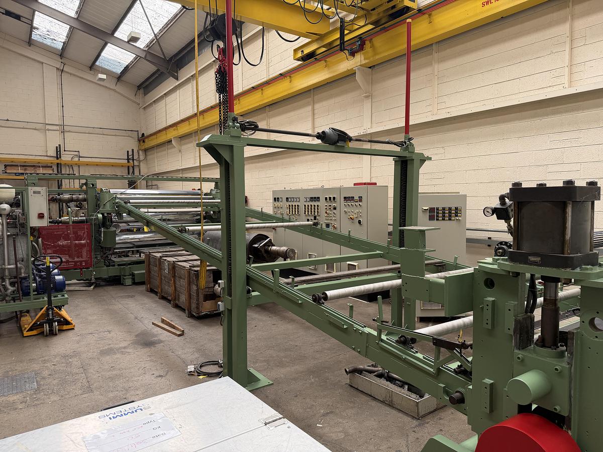 Used 2400mm wide Reifenhauser 3 roll polishing stack with thermoregulation, haul off. 2400mmx500mm individual drives. Variable speed haul off. In line knives.
