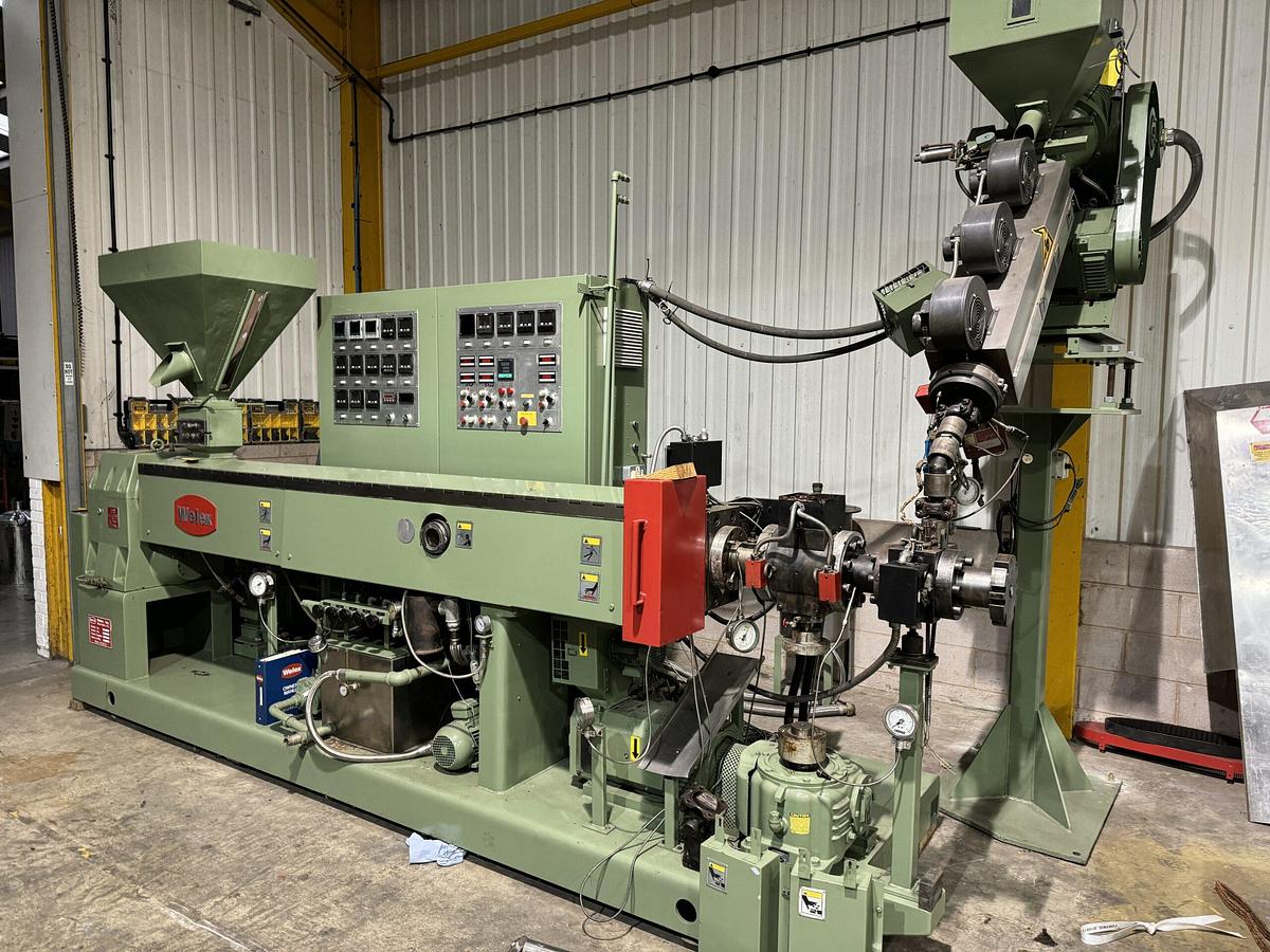 Used 1040mm wide Welex coextrusion sheet line with 90mm + 50mm extruders, GP, die, 1040mm wide x 450mm calender, pumps, haul off winder. 1996