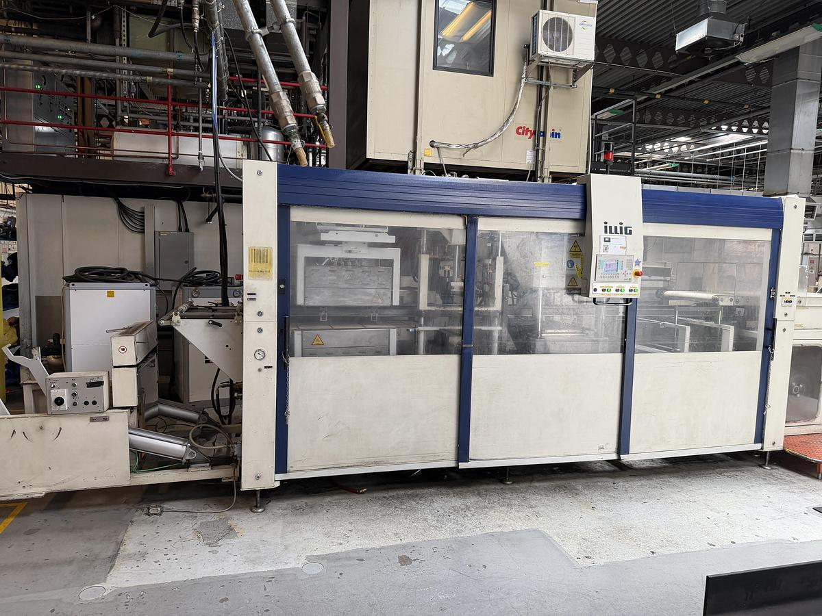 Used 500mm x 350mm Illig Model RD53 pressure forming machine 2004 with unwind and stacker