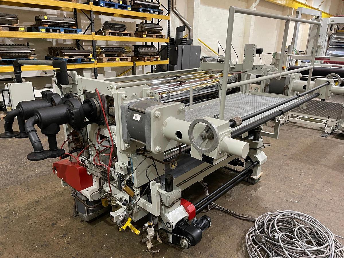 Used 1850mm wide Breyer 3 Roll Polishing Stack. 300mm diameter. Individual roll drives with planetary gearboxes. 6 x Spare rolls ( 5 chrome + 1 Matt). 3kw ac motors