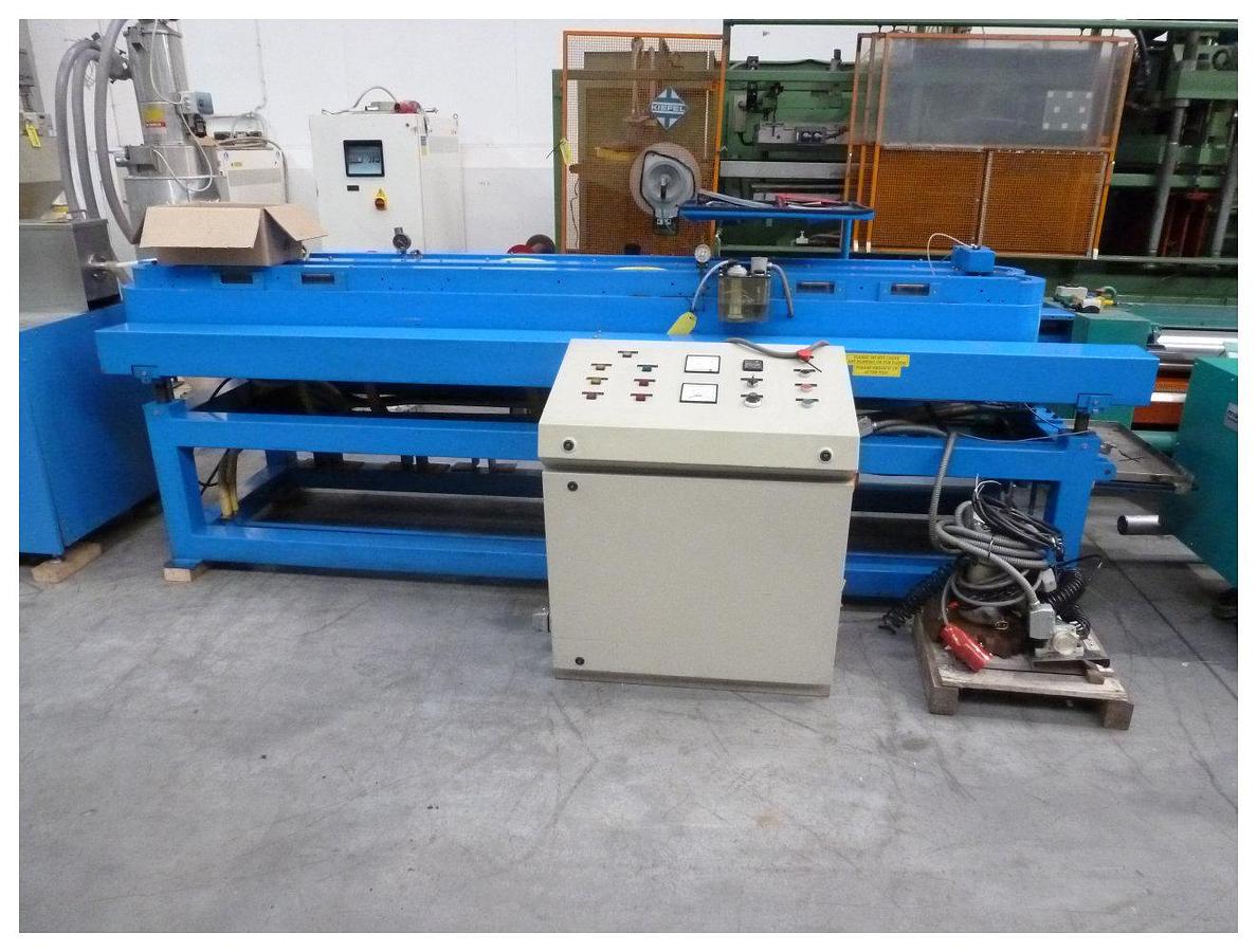 Used 32mm Corelco EC25LLV corrugator, 115 mould blocks with vacuum facility ( max 25mm dia vacuum or 30mm dia Pressure) DC Drive motor 1995