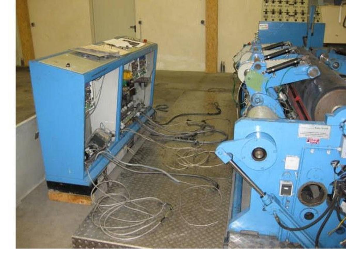 Used 2000mm Fuchs Slitter Rewinder, unwind max 1000mm, rewind max 600mm. Maximum speed 600m/min. 1986
