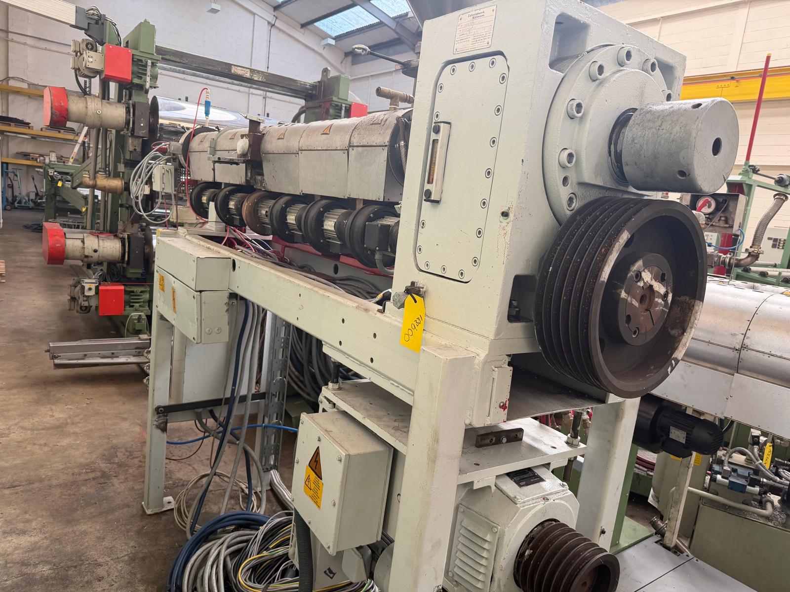 Used 60mm Kuhne 33D vented coextruder with 25kw dc motor. filter, and Normag gear pump. 2002