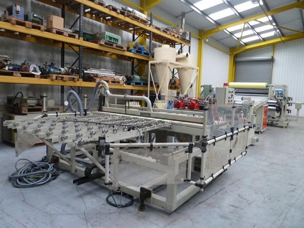 Used 1800mm wide Reifenhauser sheet extrusion line. 120mm Reifenhauser extruder, melt pump, 1700mm die, 3 roll stack, pump group, haul off, cross cut saw.