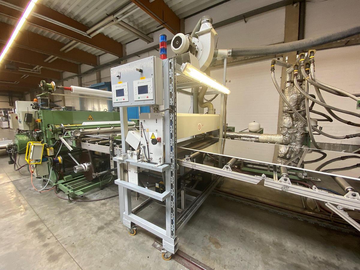Used 1800mm wide Kuhne sheet extrusion line with 125mm primary Kuhne extruder, 1600mm flex lip die 1800mm 350mm diameter rolls, haul off guillotine