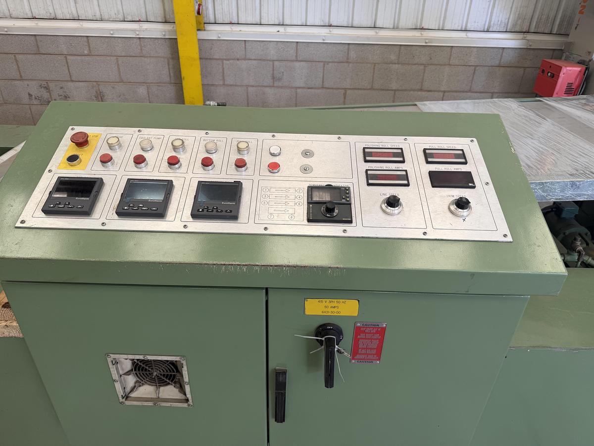 Used 890mm x 300mm Welex 3 roll polishing stack with pump group, and haul off. Silent chain driven rolls, pneumatic nip, 97