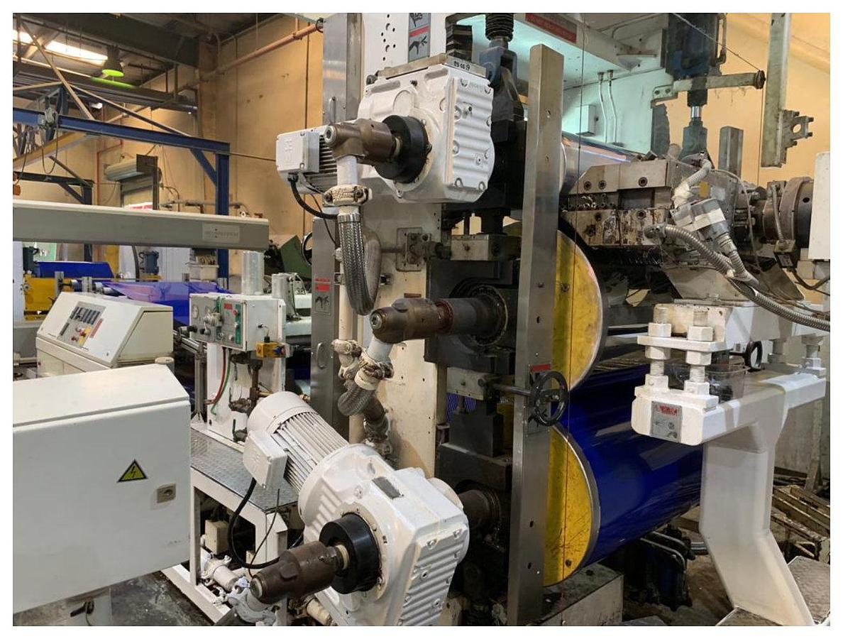 Used 1040mm Welex V-PET sheet extrusion line. 125mm ext with vac,s/changer, gear pump, 1040mm flex lip die, 300,600,600mm 3 roll stack, lam, scan, winder 2005