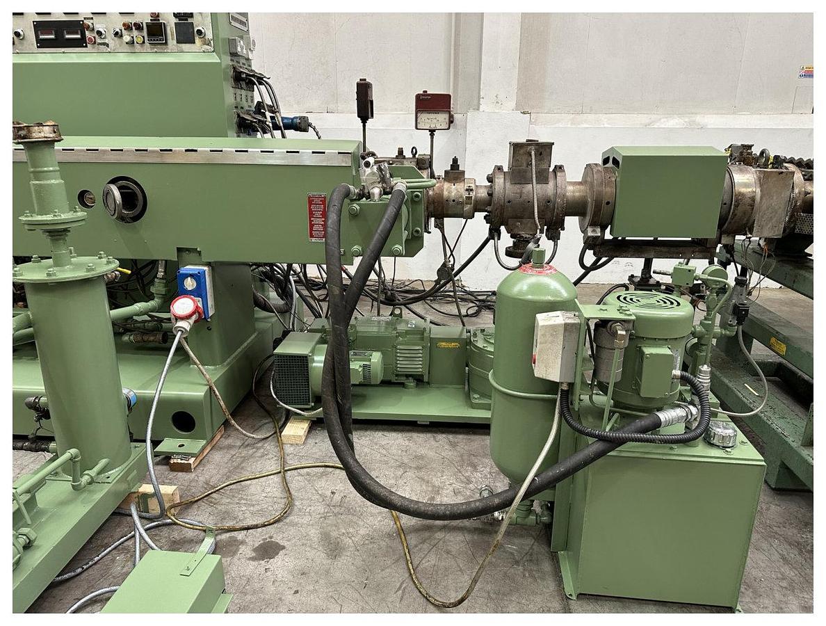 Used 1040mm Welex coextrusion sheet line with 120mm primary extruder, gear pump, 1040mm x 450mm 3 roll stack, puimps, haul off 2 station winder.
