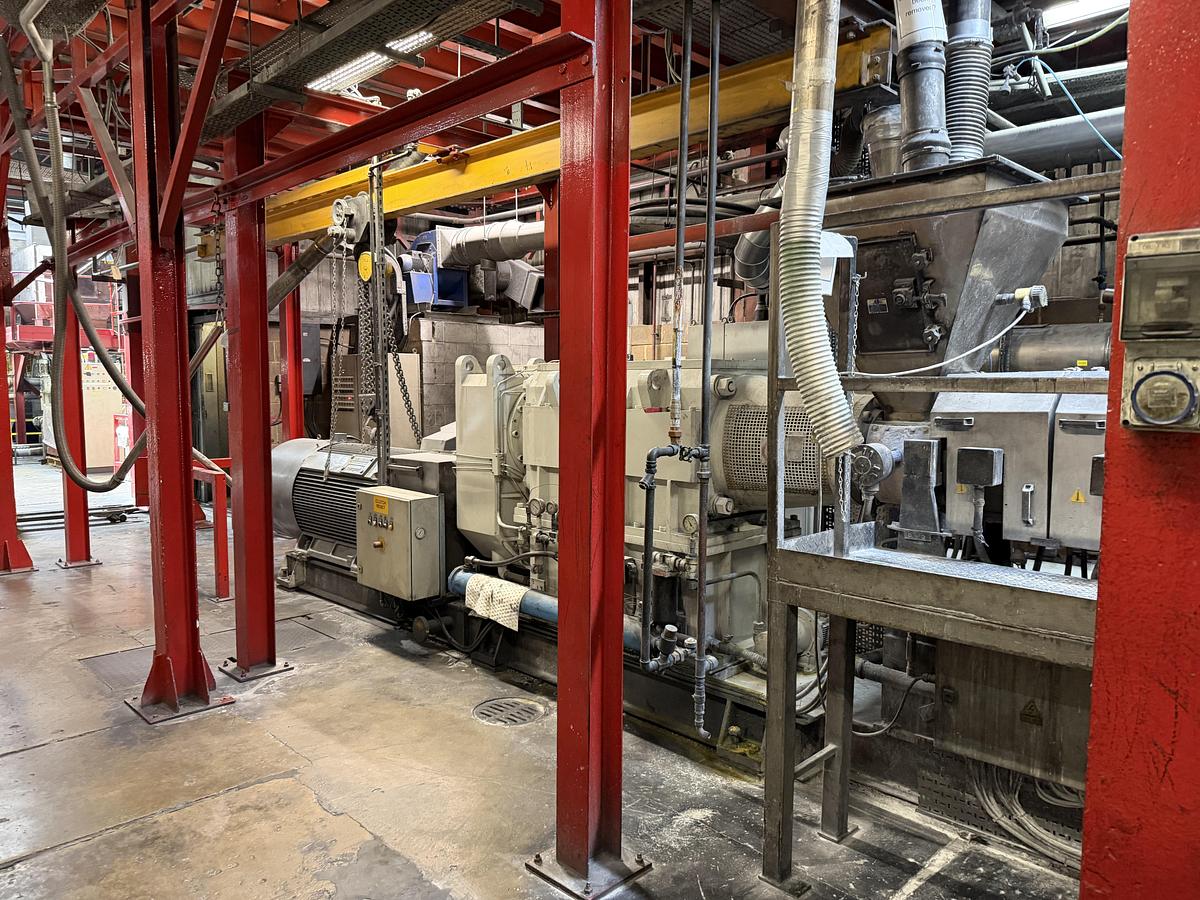 Used 110mm Berstorff model ZE110 A UT 44D twin screw compounding line. 600rpm screws. 1080kw motor. Brabender feeders. Gala EAC model 7