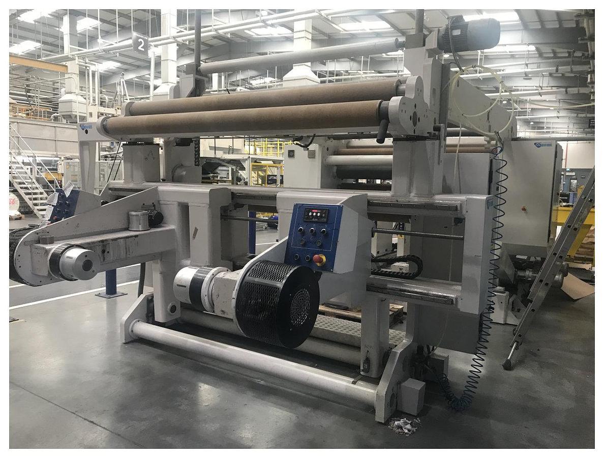Used 2030mm wide Ashe slitter rewinder with max mill roll of 1200mm. 450mpm max speed 254mm minimum slit. Shaftless unwind. Centre/Centre surface rewind 2008