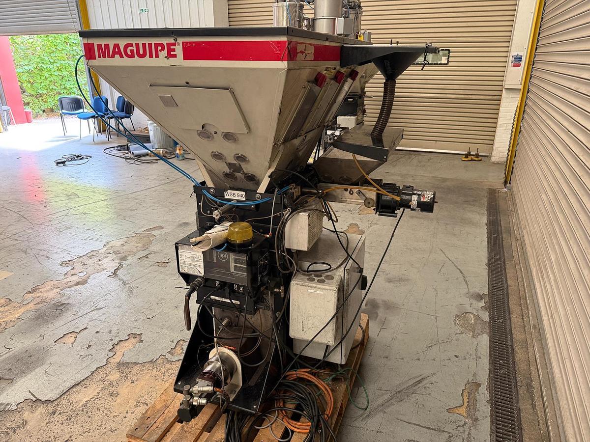 Used 4 component Maguire model WSB 940 gravimetric blender with hopper loaders, and dust collection.